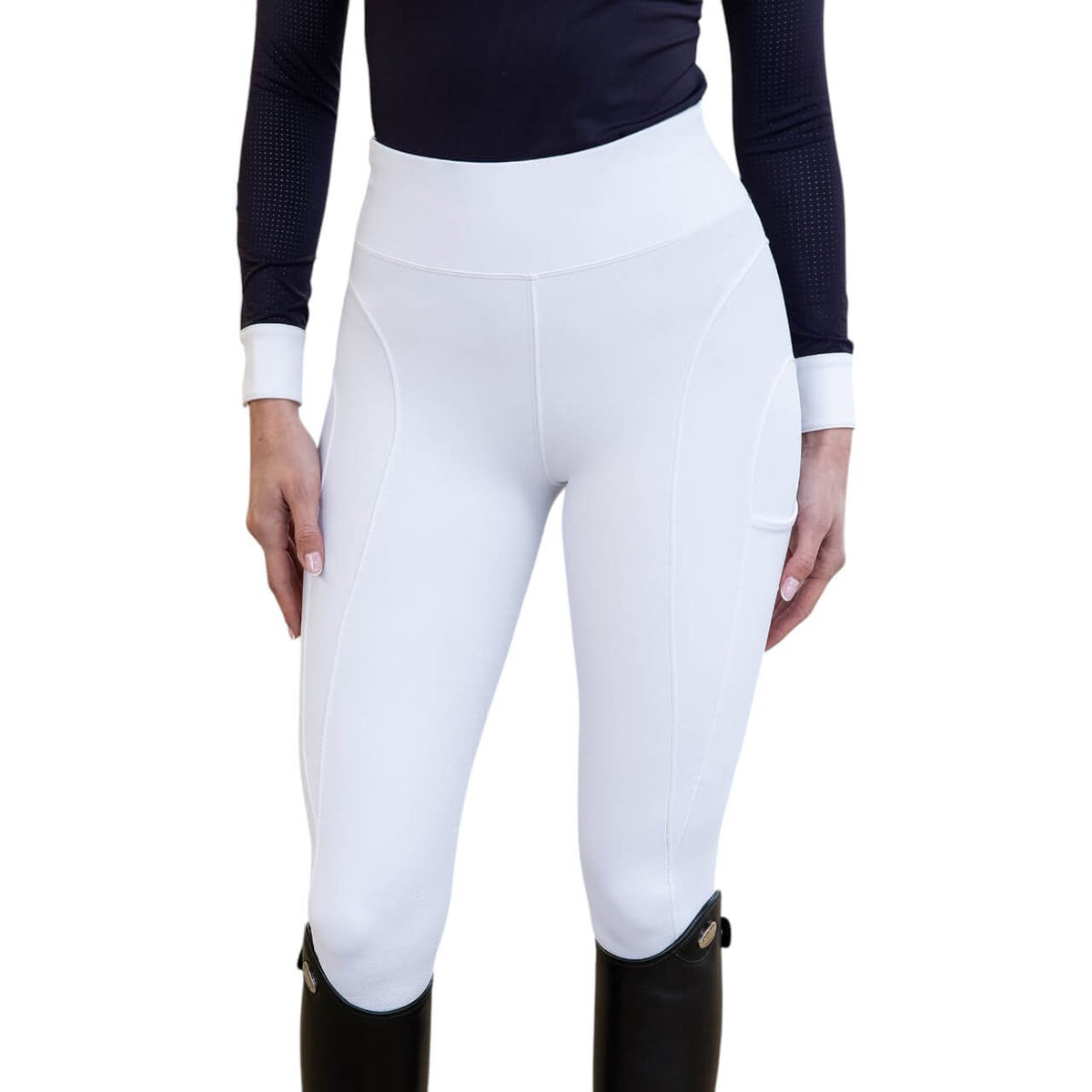 Reitleggings Damen Knee-Grip Outline Damenreitleggings, White, an Reiterin getragen.