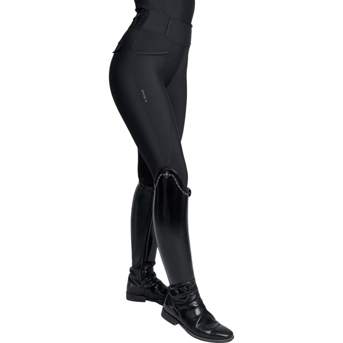 Reitleggings Damen No-Grip Pro Riding Leggings, Schwarz, getragen an einer Person mit Reitstiefeln.