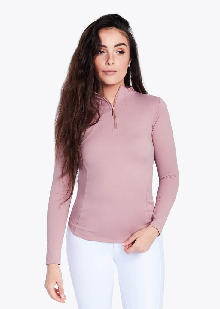 Maximilian Equestrian Base Layer Damen Long Sleeve Funktionsshirt, Rosa, Person trägt das Shirt.