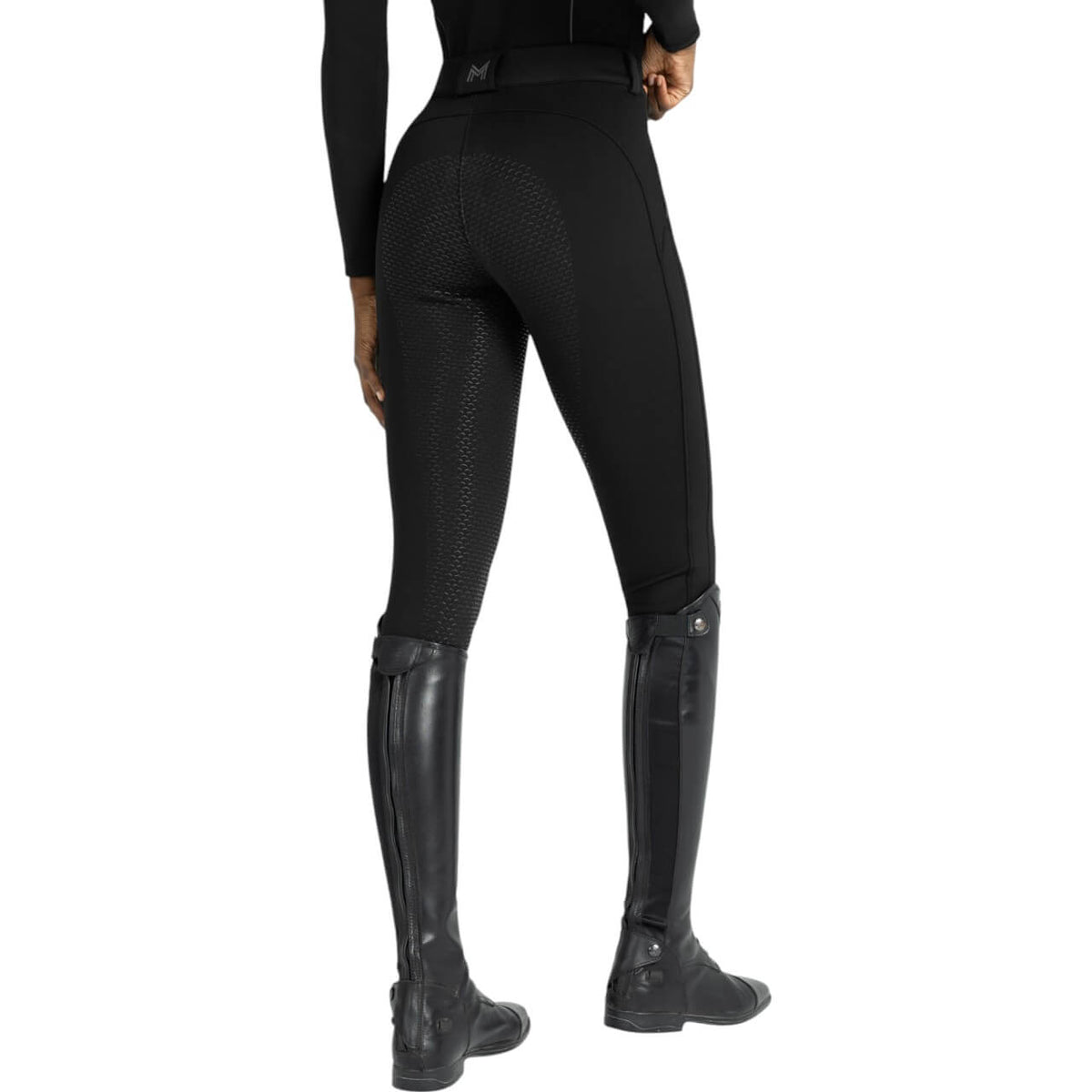 Reithose Damen Full-Grip Arctic Fleeced Breeches, Schwarz, Person trägt die Reithose mit Reitstiefeln.
